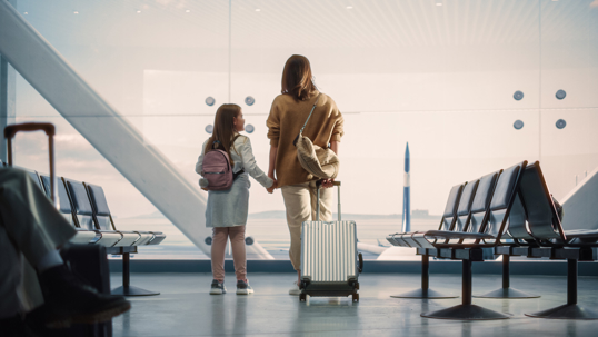 Mother and child in airport