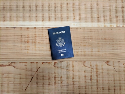 passport on wooden floor