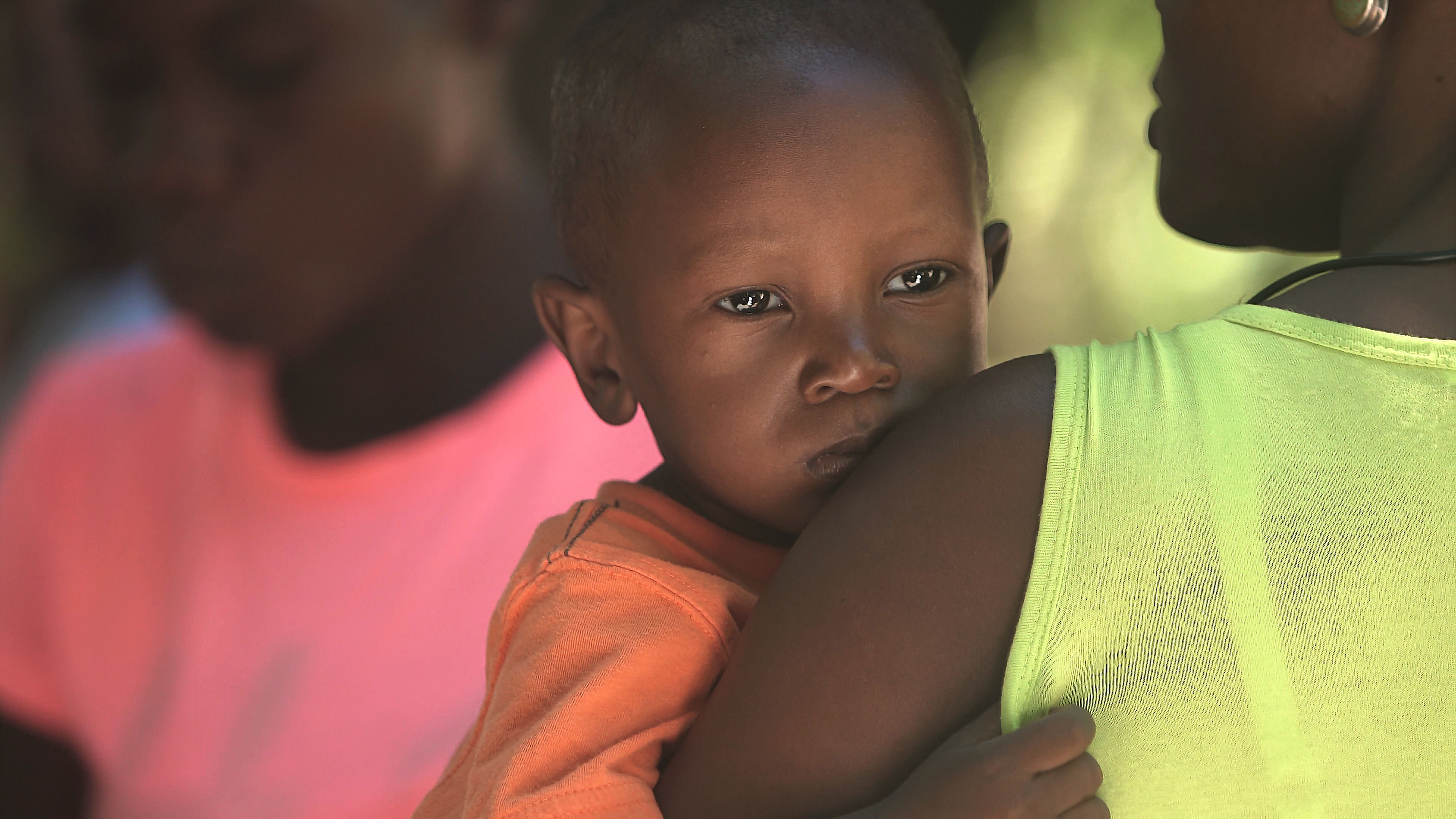 Child being held